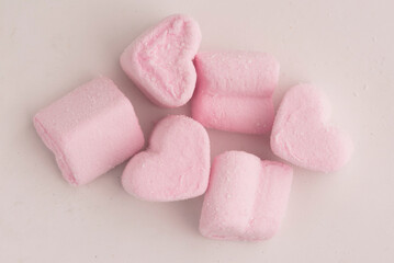heart shaped marshmallow on gray background