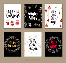 Set Christmas and Happy New Year greeting cards with handwritten lettering and decorative winter holiday elements.