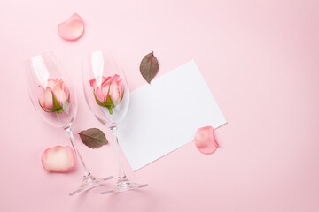 Champagne glasses with rose flowers