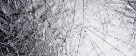 silver texture background. Reflector fabric with folds and wrinkles