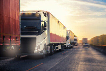 Plakat Truck with container on highway with sun light, concept cargo transportation. Blur move effect