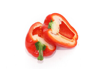organic red and yellow bell peppers isolated on white background.