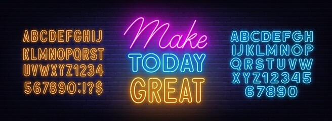 Make Today Great neon lettering on brick wall background.