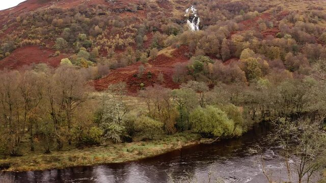 AERIAL - River Falloch and Ben Glas burn waterfall, Glencoe, Scottish Highlands