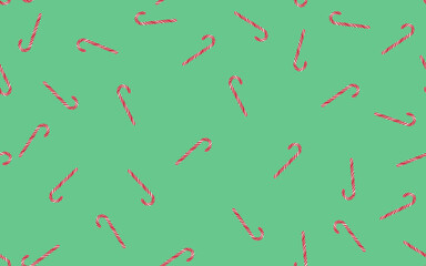 Seamless pattern of striped candy canes on a green background.