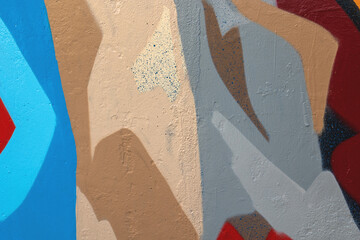 Closeup of colorful blue, beige and gray urban wall texture. Modern pattern for wallpaper design....