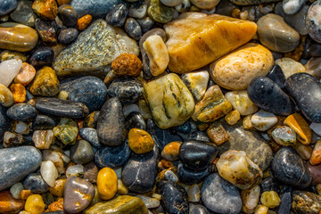 abstract background with round pebble stones. Vacation holiday recreation on beach concept. High quality photo