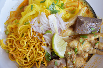 Khao Soi in Northern Thai food. Choose focus and blur according to lens character. Close-up picture