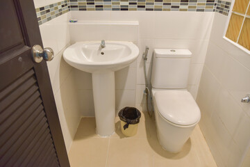 sanitary ware or toilet of a resort or hotel bathroom, white room and no one in the picture.