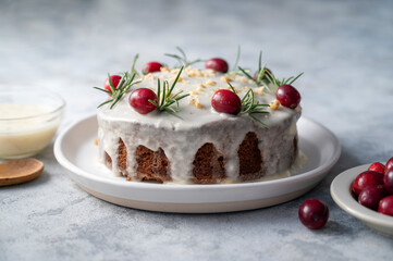 Christmas cake with fresh cranberries.