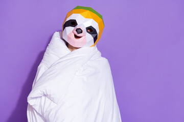 Photo of young guy cover himself warmth blanket sleepy sleepover isolated over purple color...