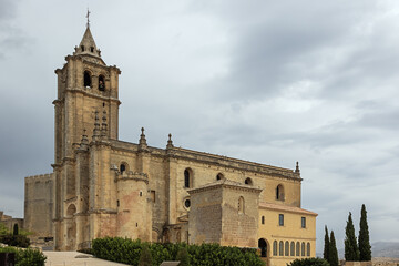 Fototapeta na wymiar Side view of the Main Abbey church inside the Fortress of La Mota, a large walled enclosure above Alcala la Real