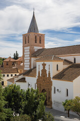 Fototapeta na wymiar View of the Santiago church in Guadix in the middle of the town