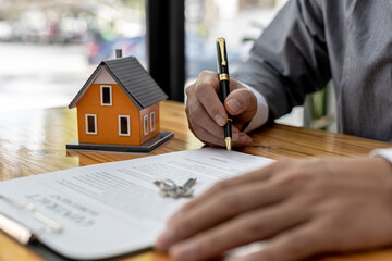 A salesperson of a housing project is drafting a sales contract for a customer who reserves a house...