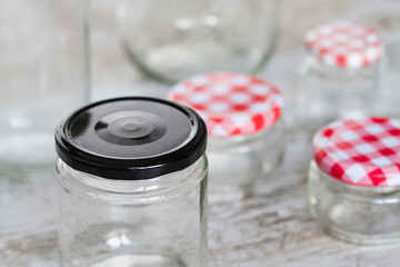 Empty glass jars of different sizes