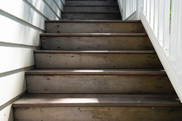 Vintage stairs, Old rustic wooden staircase , selective focus on the wooden steps.