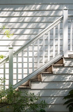Vintage stairs, Old rustic wooden staircase of white house