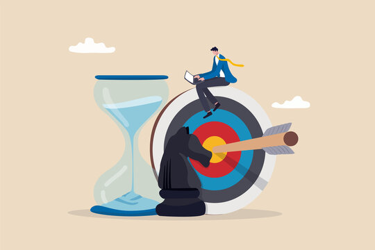 Business strategy, planning to achieve goal, management for company growth opportunity, market success goal, smart businessman working with computer sit on target with chess knight and sandglass.