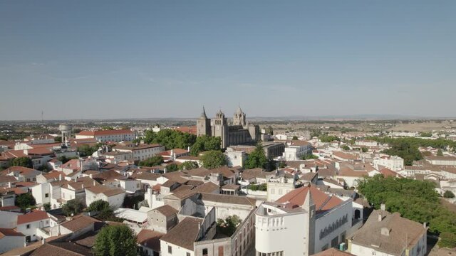 Evora cathedral monastery in Portugal, aerial view, wide orbital shot cityscape in Europe