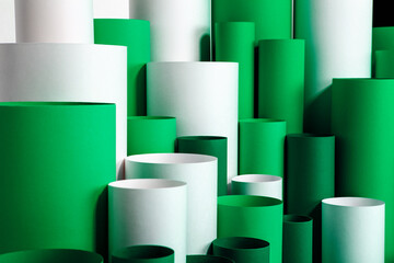 Green and white paper tubes organized into an abstract composition for infographics