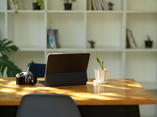 Simple working desk with digital tablet computer and camera