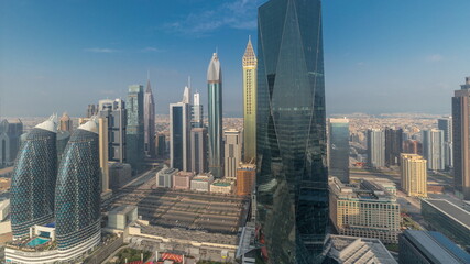 Obraz premium Panorama of futuristic skyscrapers in financial district business center in Dubai on Sheikh Zayed road timelapse
