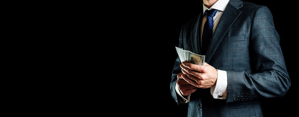 Hundred dollar bill. Rich businessman holding Washington American cash. Usd money background.