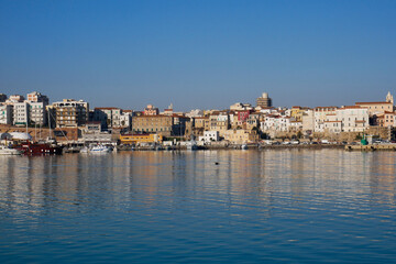 Fototapeta na wymiar Termoli - Molise - The Adriatic town seen from the port.