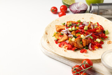 Concept of tasty food with taco on white background