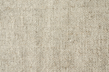Fototapeta na wymiar Grey background of coarse linen with a texture