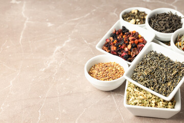 Concept of cooking tea with different types of tea on light textured background