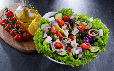 Composition with a vegetable salad bowl