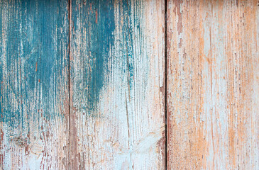 Fototapeta na wymiar Old blue and grey wooden background with cracks and scratches in vintage style