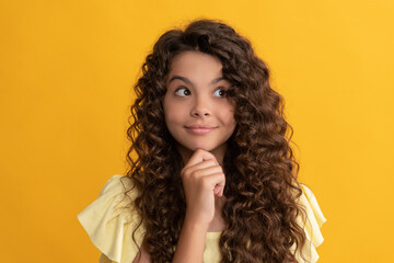 smiling kid with long curly hair and perfect skin, beauty