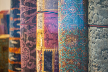 sale of traditional bright colored textiles and fabrics on the street market in the old town