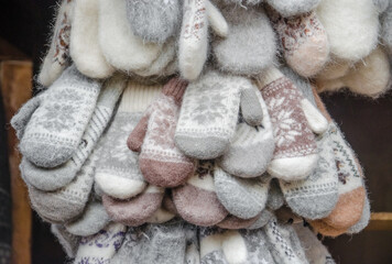 Fototapeta na wymiar Knitted woolen mittens