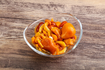 Marinated pickled honey mushrooms in the bowl