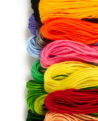 A set of multicolored threads for embroidery isolated on white bacground