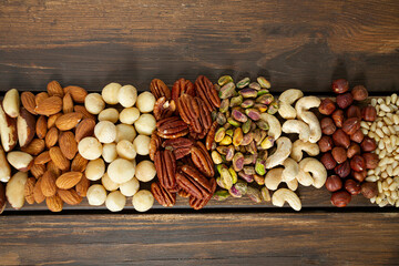 assortments of nuts on wooden surface