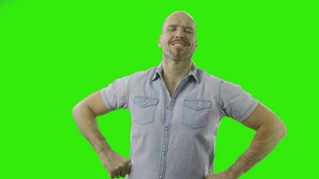 self-confident guy is flexing with his muskels