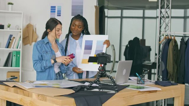 Mixed Race Fashion Vloggers are Vlogging About Fashion Design, Talking to Followers in the Studio. Stream of Talented Stylists, Online Seminar. Social Networks, Small Business and Blog Concept.