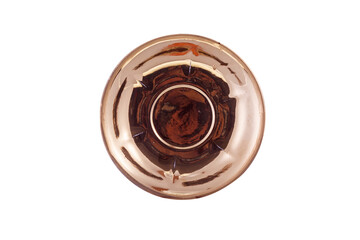 Ceramic gold saucer isolated on white background. Copy space.