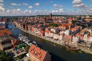 Gdansk. A city by the Baltic Sea on a sunny beautiful day. Aerial view over the seaside city of Gdańsk. - obrazy, fototapety, plakaty