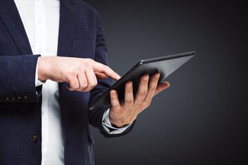 Man using digital tablet, close up. Technology concept