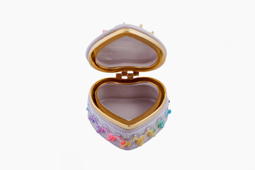 Decorative ceramic heart shaped jewelry box isolated on white background. Copy space.