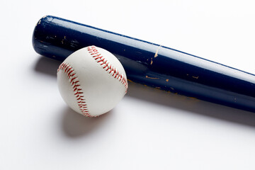 Baseball ball and blue wooden bat on white background with copy space