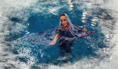 Pretty young woman relaxing in the pool.
