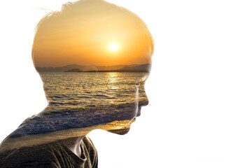 Combination of the silhouette of a child face and a seascape. Concept of unity of nature and people, caring for ecology - 473515418