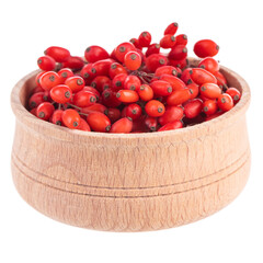barberries in wooden cup isolated on white background