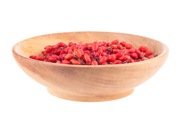 barberries in wooden plate isolated on white background